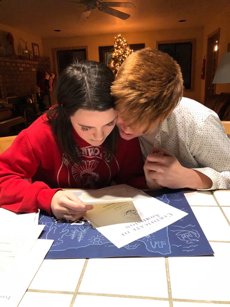 Reading Khyla’s acceptance letter into the George Fox Honors Program