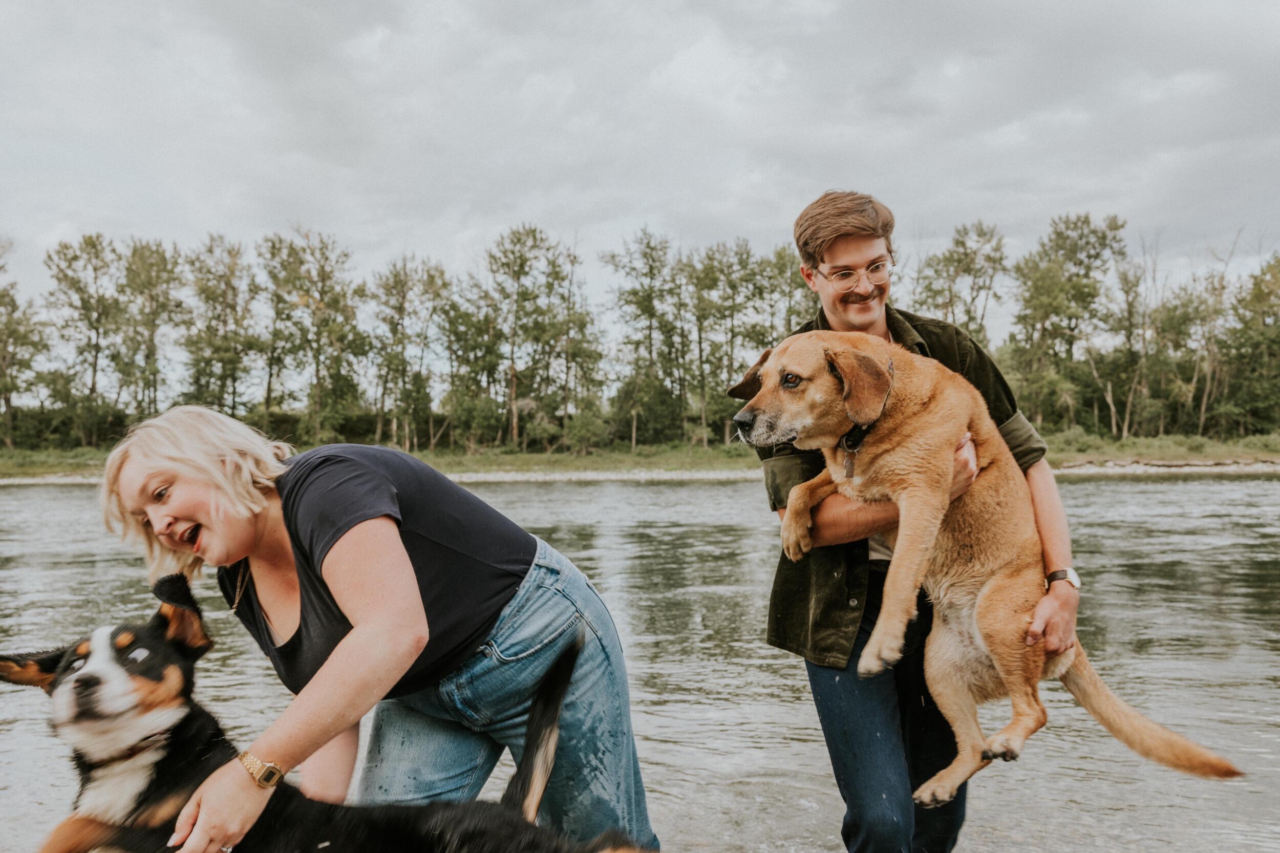 J:“Yes dear, we can bring the dogs”