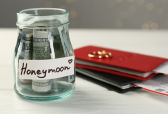 Honeymoon cash fund in glass jar