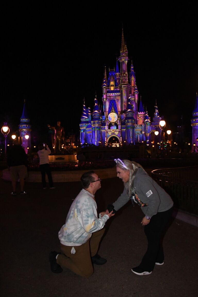    This trip to Disney was an absolute dream come true. Together they saved, persevered through many obstacles, and worked hard to have the vacation of a lifetime. 

   At midnight in front of Cinderella's castle Dylan bent down on one knee and surprised  Kyleigh  by asking her to spend the rest of their life's together. Kyleigh was so excited she could barely contain herself.  One minute they were swirling around in the cool Florida air on a magic carpet ride, and the next they were engaged high in the sky spinning on the Astro Orbiter while the glowing lights of Tommorland danced around them. Engulfing the couple in the feeling of true love that  belongs in fairy tales they were in awe and couldn't keep their eyes off of each other, and the newly adorned shimmering addition to Kyleigh's left hand. As they slowly left the park, feeling the soreness in their feet  start to set in from the 18 hour park day they looked forward to a great big beautiful tommorow that was coming. 