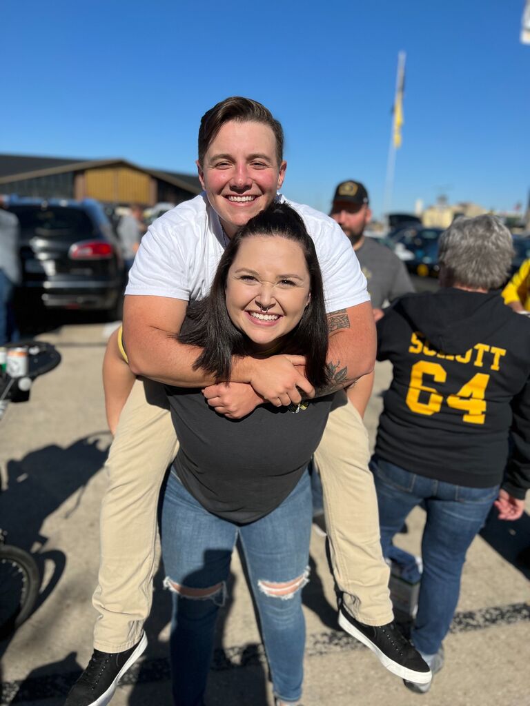 Grayson thankfully converted Brittany to an Iowa Hawkeye fan from the worst team the Nebraska Cornhuskers. Now we get to experience a lot of sporting events together and cheer on the Hawks!