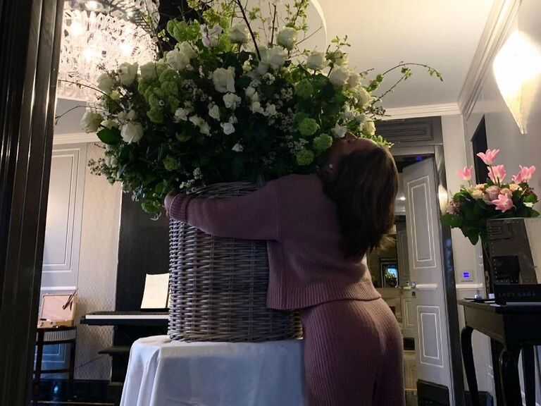 Lady Gaga hugging huge flower display from her boyfriend