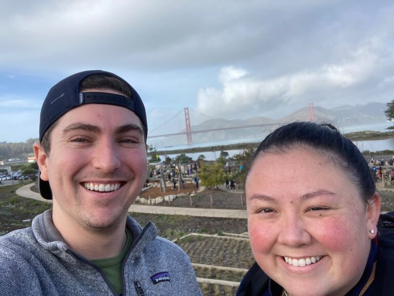 Tori and Joe walk in the Presidio. 