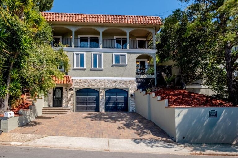 Roy and Amber buy their first house together in Belmont, California.
