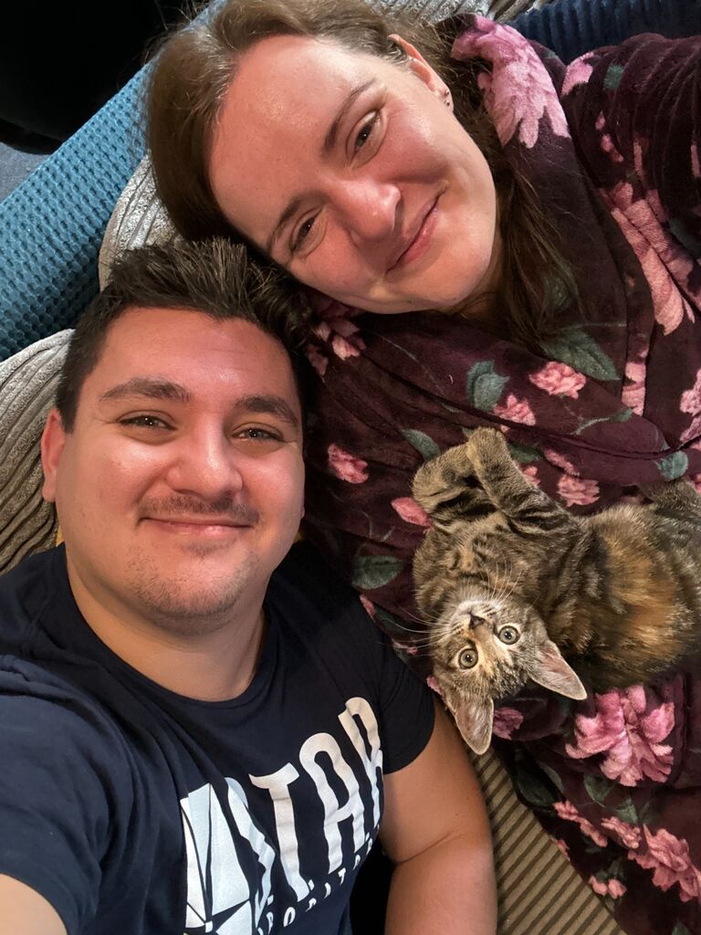 After a few months of cohabitation Matthew surprised Emily by bringing home their first little one -  Mayhem the kitty!