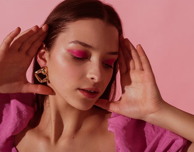 Woman wearing pink eyeshadow for Valentine's Day
