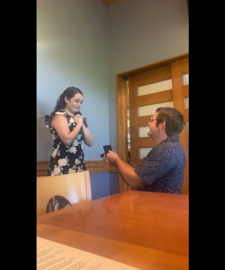 Chad finally proposed to Cali at Fin's Restaurant above Sharky's Pier in front of both their families.