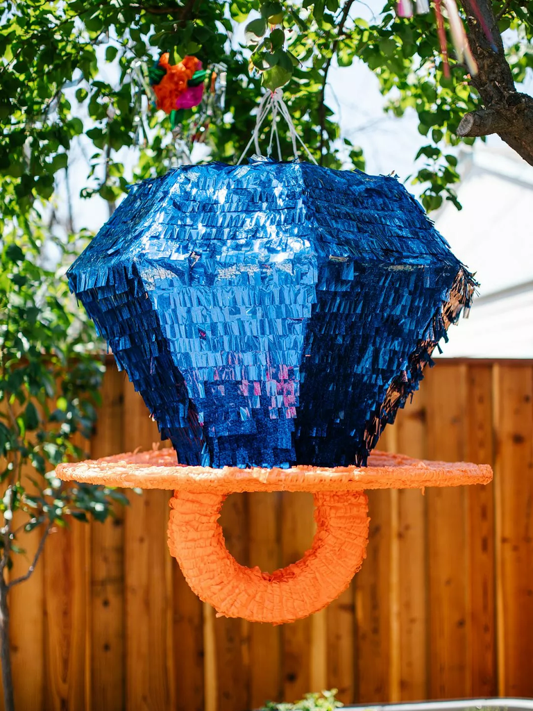 Fun retro wedding Piñata in the shape of a blue ring pop