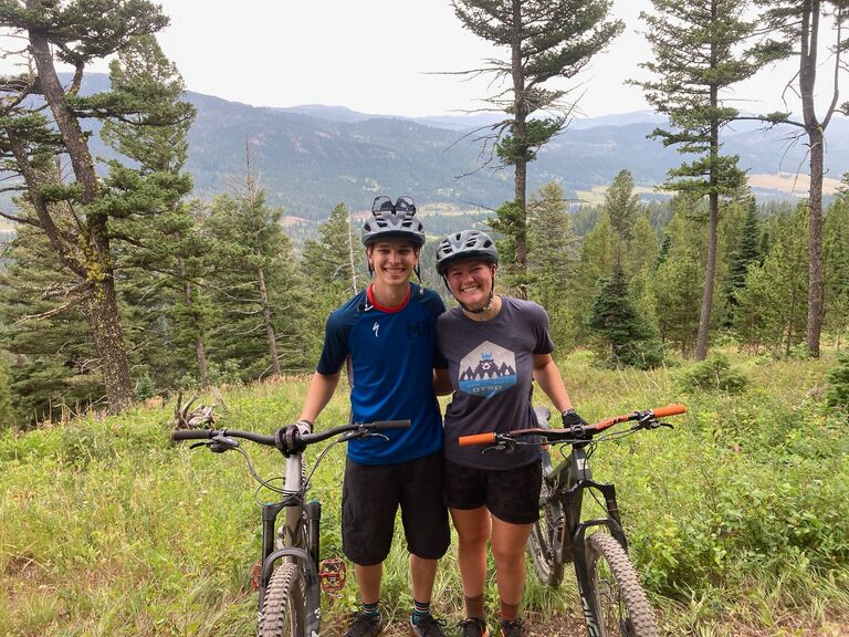 Gavin and Julia riding bikes at crosscut before the third time they'll be living apart, little does she know