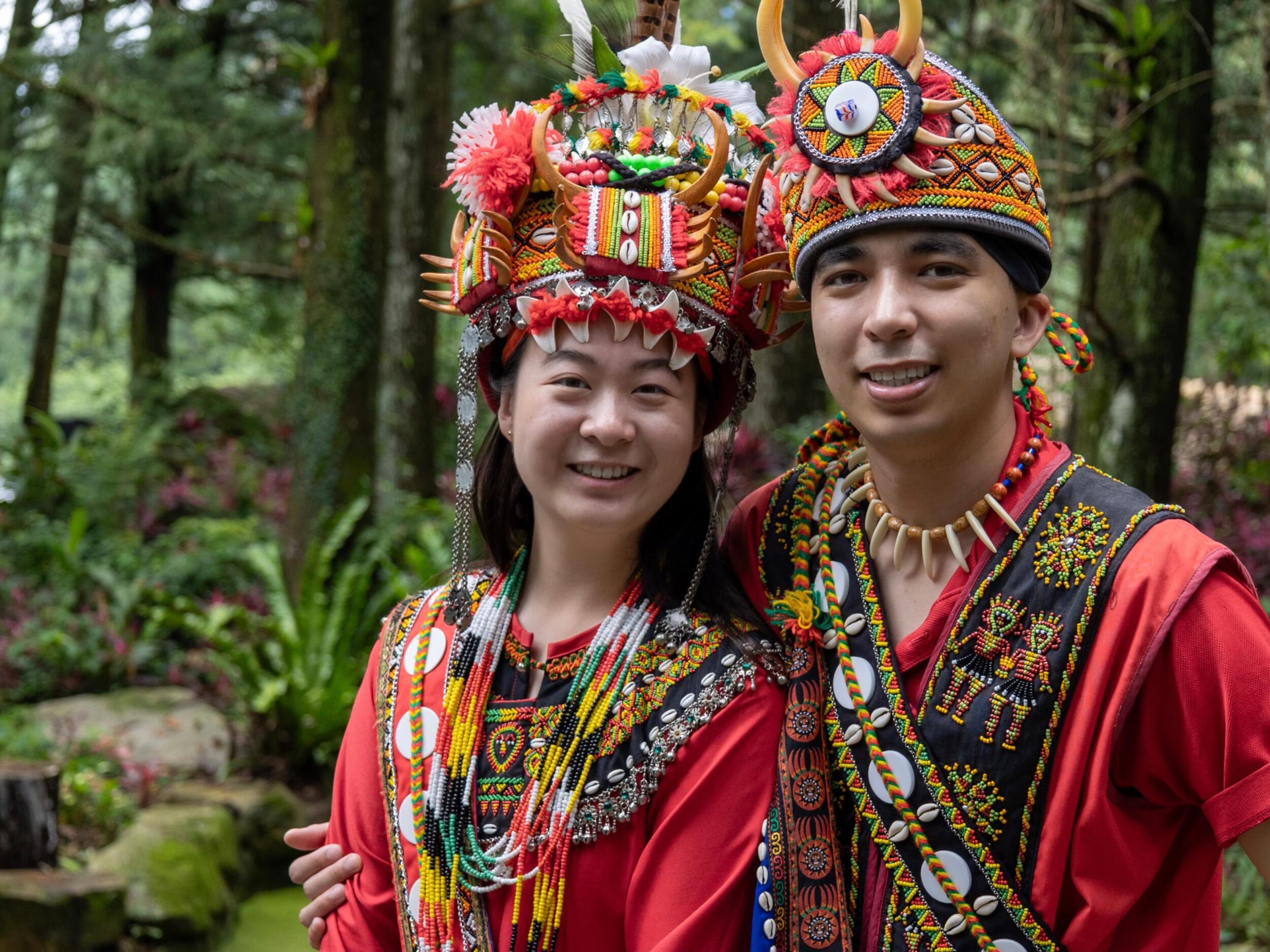 Poor Garrett humoring me and his momma as we dressed up in traditional Taiwanese indigenous tribe marital robes.