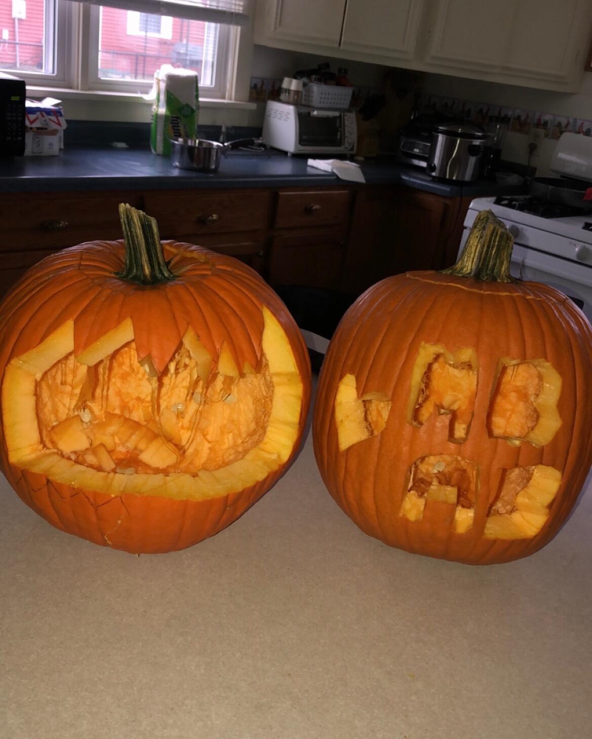 Our very poor attempt at carving pumpkins & spending our first Halloween together
