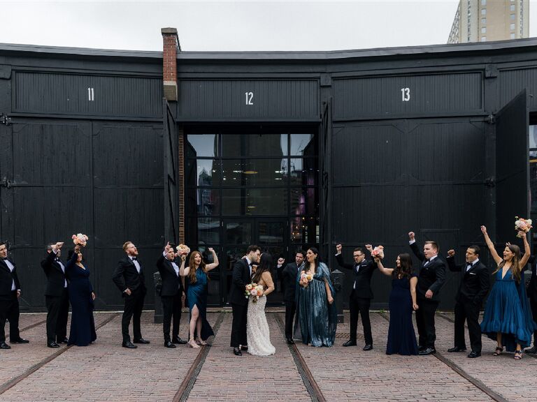 Jamie Milne and husband Brandon surrounded by their wedding party
