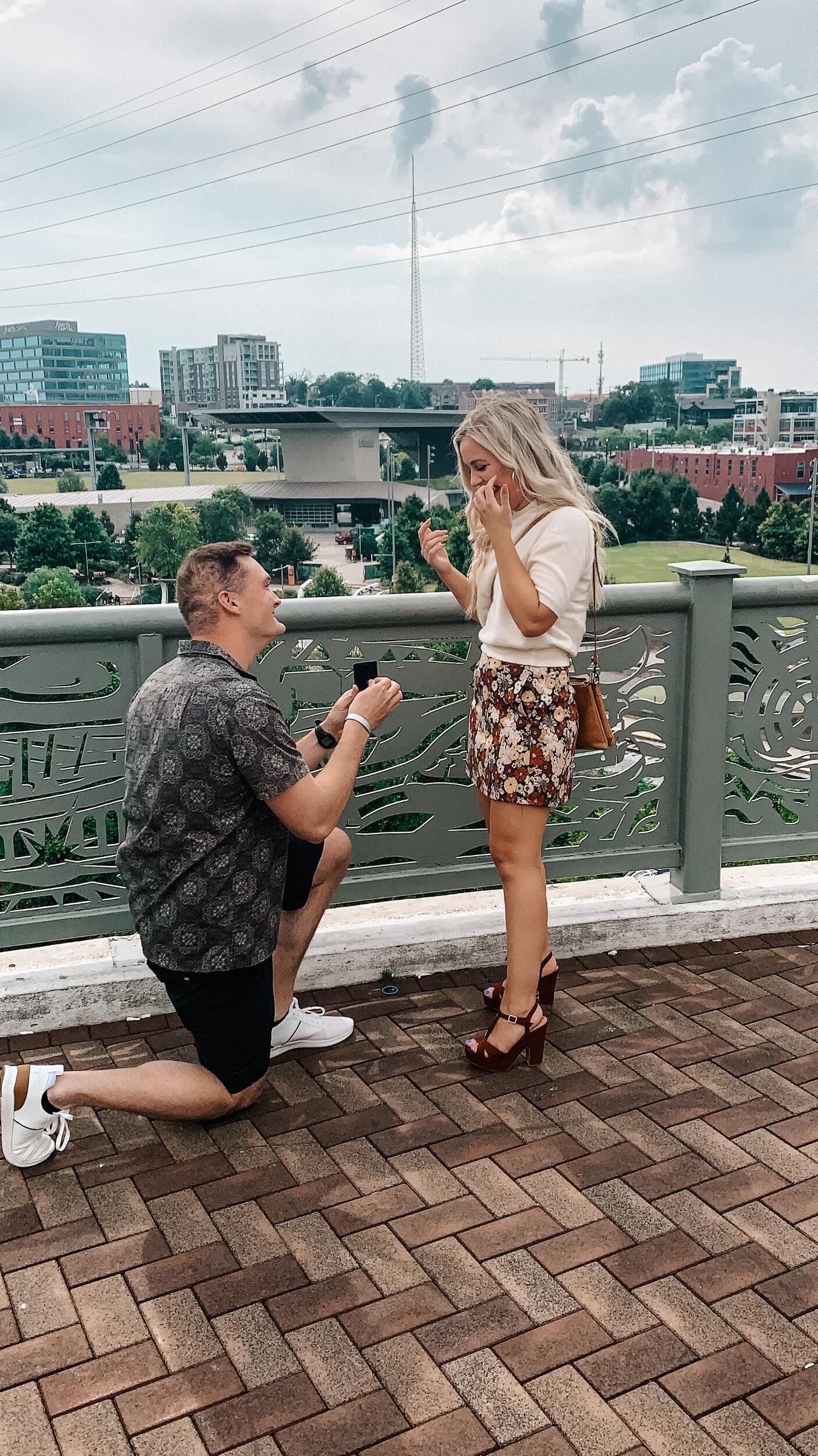 Joe proposed!! 
He proposed while walking along the Pedestrian Bridge in Nashville and we celebrated at lunch with our friends afterwards.