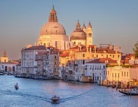 Sunset view of Basilica di Santa Maria della Salute and Grand Canal, Venice, Veneto, Italy 