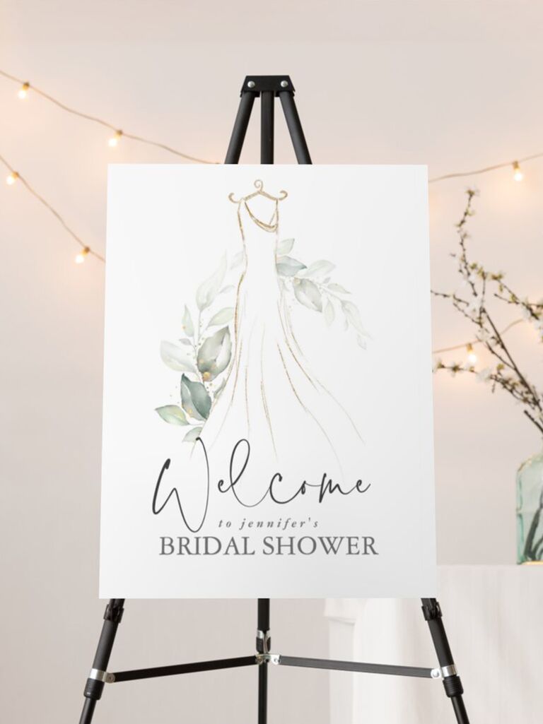 Greenery and wedding dress sketch with 'Welcome' in handwritten script
