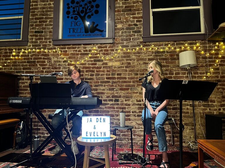This is a photo from our very first gig together! Not long after, we would decide to start a music duo called Santini Rose and perform live at weddings, banquets, restaurants, anniversary parties, and more!