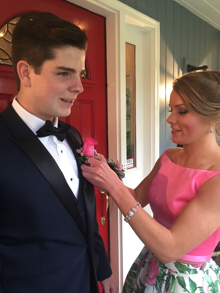 The story begins in high school! Though Emma and Charlie knew each other through out their time at Hinsdale Central, Emma made the first move in sending a text to Charlie asking to be his date at prom. Charlie, not having her phone number, responded with "Who is this?".