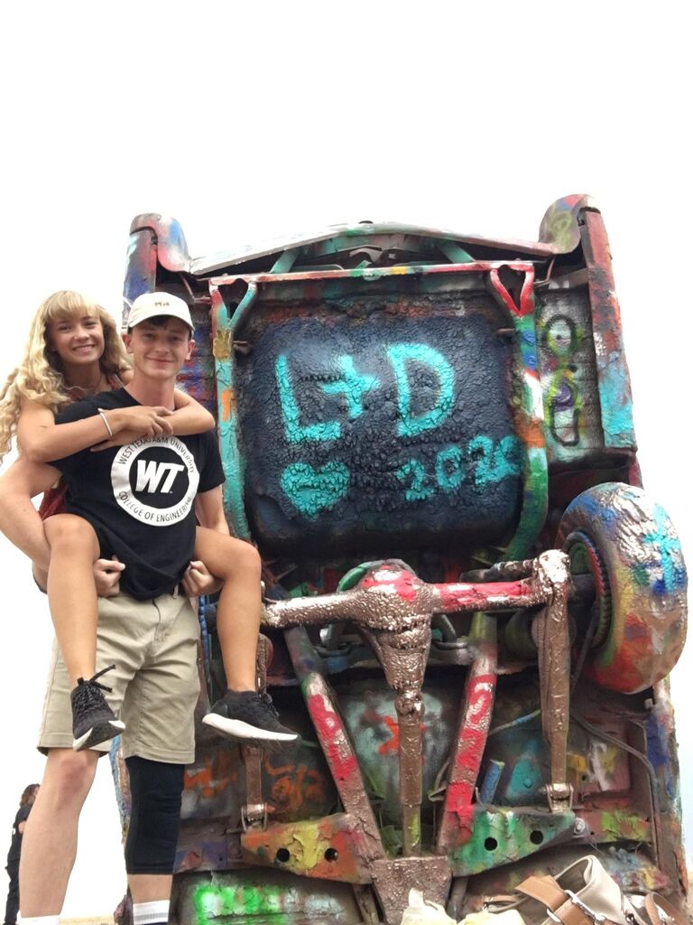 Made our mark on Cadillac Ranch during our first summer of dating.