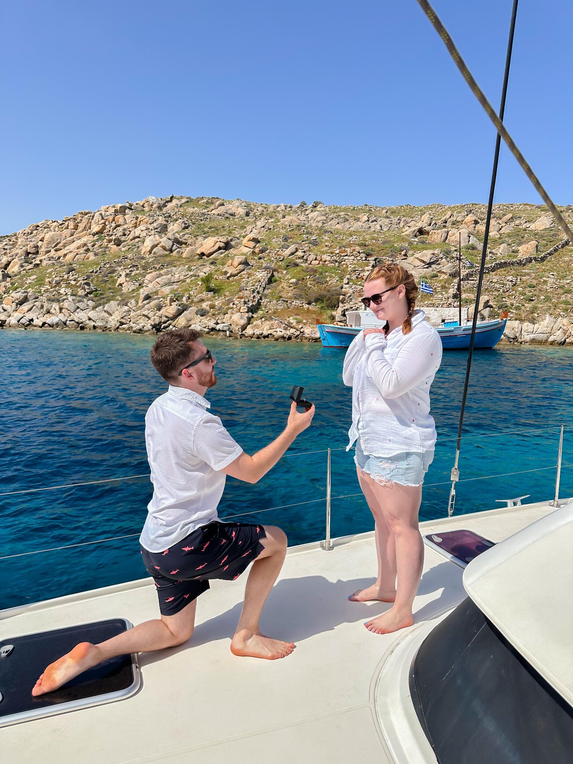Thomas proposes on a private catamaran in Mykonos, Greece