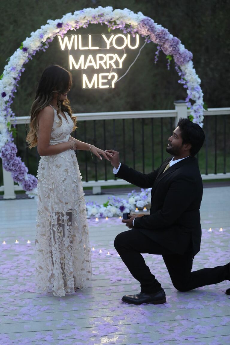 76 people hid into a cottage waiting for the surprise proposal, followed by a celebration with family & friends.