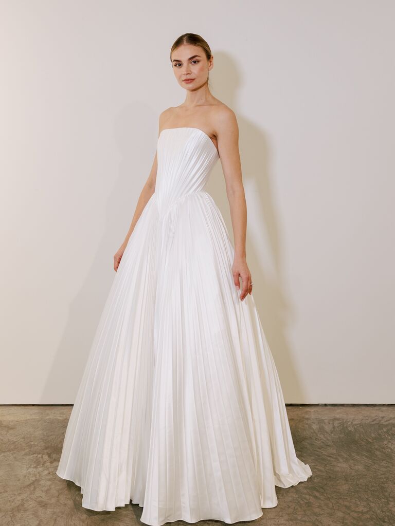 Pnina Tornai strapless wedding dress with luminous pleated fabric and A-line skirt