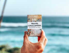 'Travel Challenges' book with map design cover