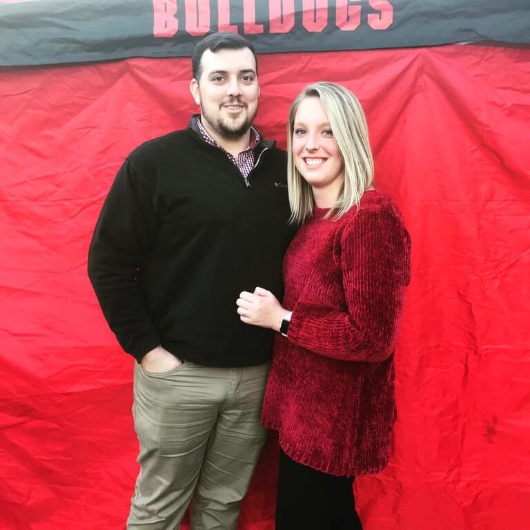 Gavin and I met on October 6, 2019. Gavin and I both were asked to go on a trip to the Atlanta United Soccer game. I was going for a Columbus State University work trip, and Gavin was asked by his friend, Mason, to come with him. That day we both did not feel like going anymore, but I am sure glad we did. I was rushing from a lunch with friends and was unable to get a box for my pizza, so I walked onto the bus for the soccer game with two slices of pizza in my hands (the pizza had broccoli on it), my backpack, my laptop, and a pillow. During this time I was working three jobs and had to use every second I had to study and/or sleep. Gavin saw me and decided to come sit behind me on the bus. We didn't say a word to each other till we got to the game. We finally started talking thanks to our Atlanta United apparel, and both knowing Mason. We got separated at the game. However, on the way home we talked the entire two hours. We both knew something clicked, and Gavin asked for my number. 

I ended up getting the flu, and was super busy with school and my 3 jobs. So, we ended up not going on our first date for almost 3 weeks! On our first date Gavin took me to Old Chicago for dinner (he thought it would be funny) then bowling (which I won), and then we went to see the Joker because we did not want the night to end. 

After our 2nd date I knew that Gavin was different. I started to tell my friends that Gavin may be my person.

Our official anniversary date is November 9th because Gavin took me to the Georgia football game. During this game I met Gavin's dad and future step-mom, Bryan and Sanna. Gavin and I had not discussed if we were officially dating yet, but Bryan introduced me as Gavin's girlfriend, so we rolled with it. Since then it has been our dating anniversary! 