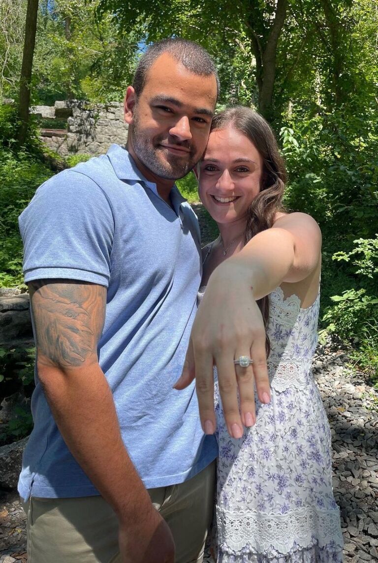 Brandon planned the perfect proposal at their favorite hiking spot in Maryland. Dani wore her best hiking attire.