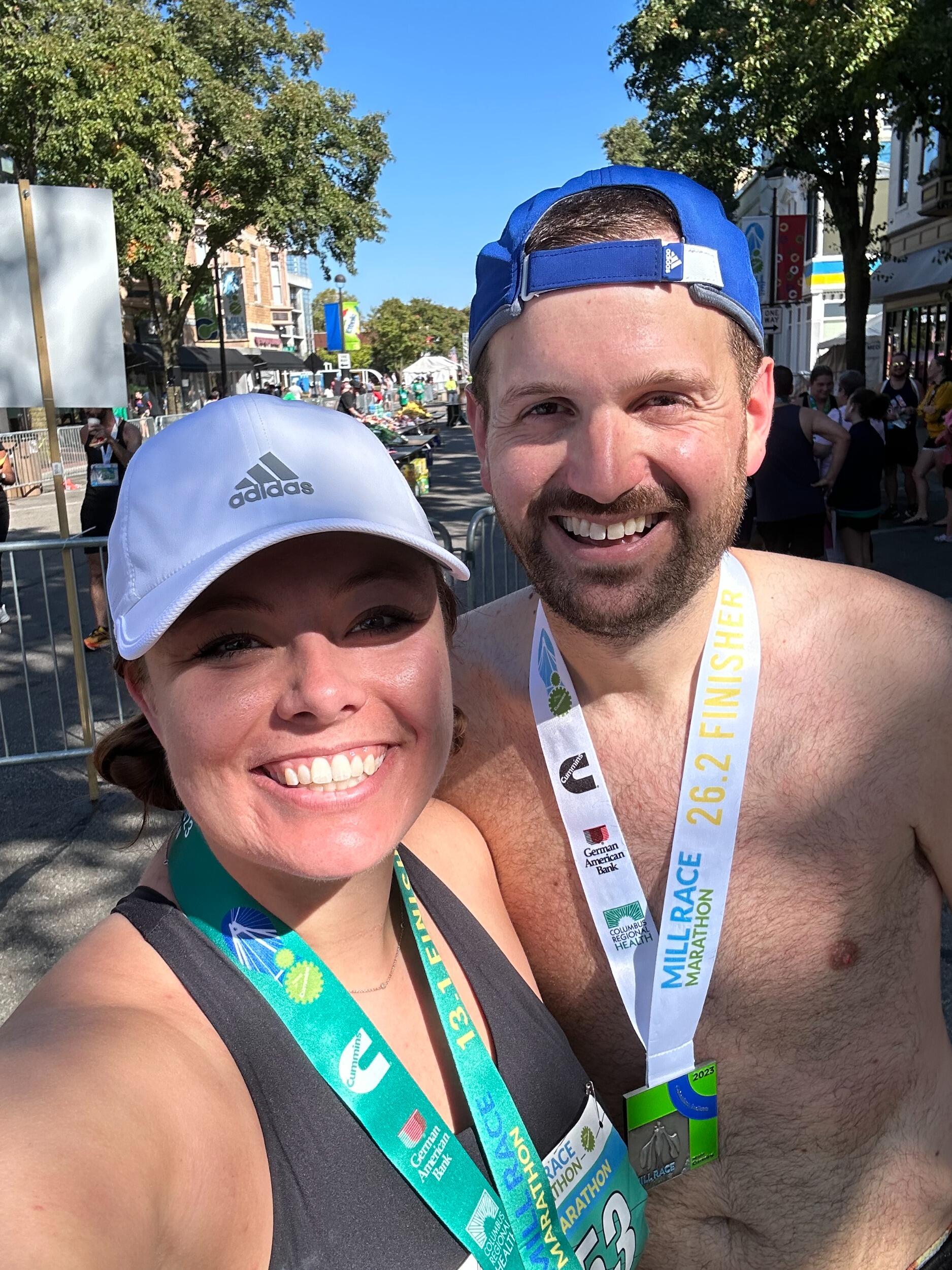 That spring, the two signed up for their first race together in September. How Phil, the runner, got Sydney, the avid not runner, to participate, is still a mystery. It has been said her thoughts were "I can walk that far in Disney in one day." Not exactly the same thing, Sydney. 
A really great summer went by and had some training sprinkled in there, so that Phil could run his 6th marathon and Sydney could run her first half. They both crossed that enjoyed their medal and banana :)