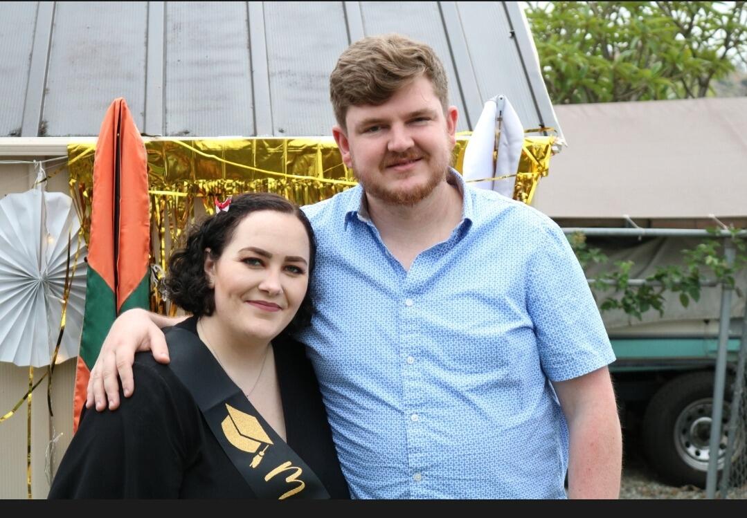 The two spent many months traveling back and forth to visit one another. This particular photo was taken at Kayleena's graduation party.