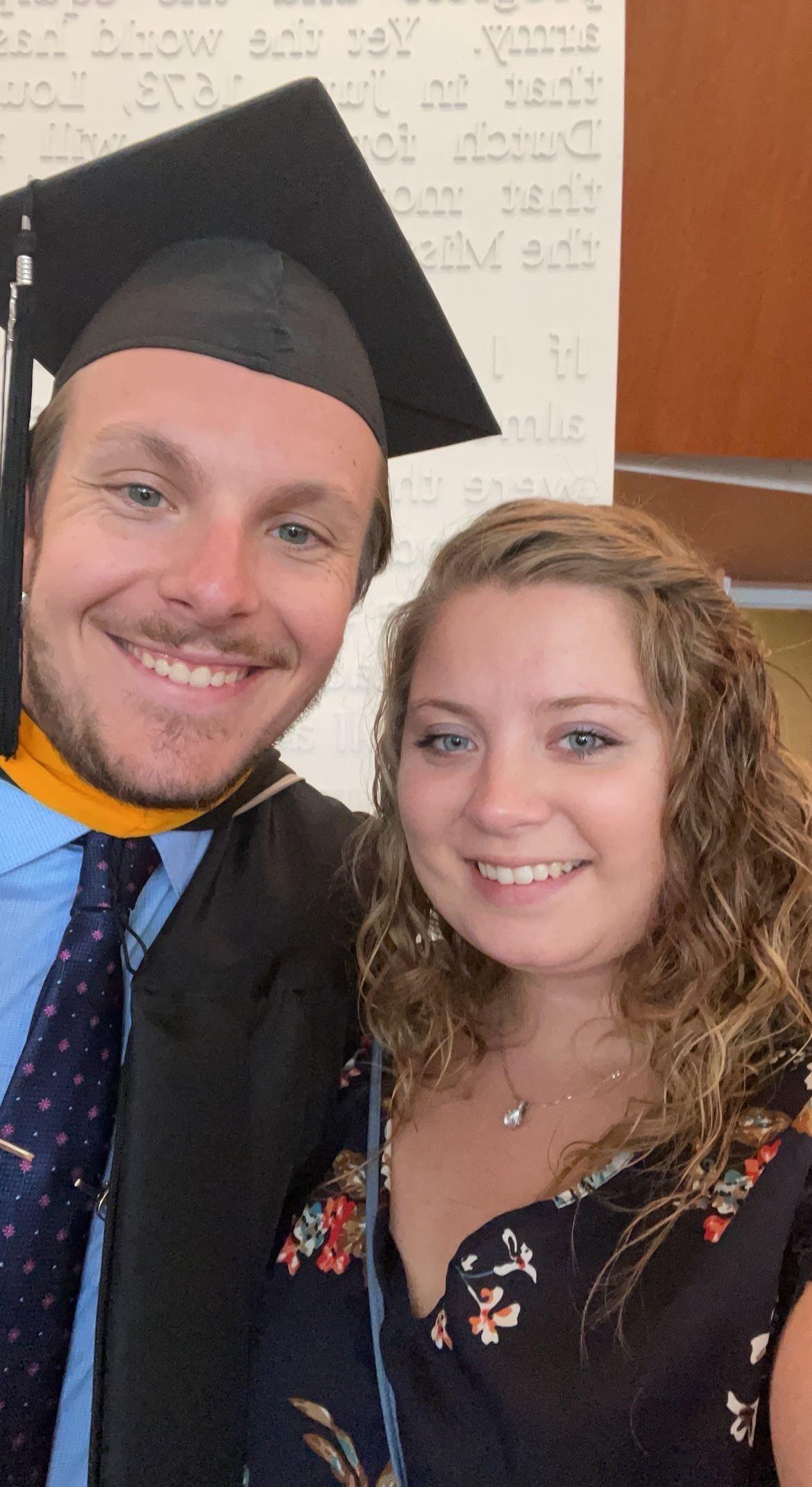 Sam graduates with his master's degree in Sport and Recreation Business