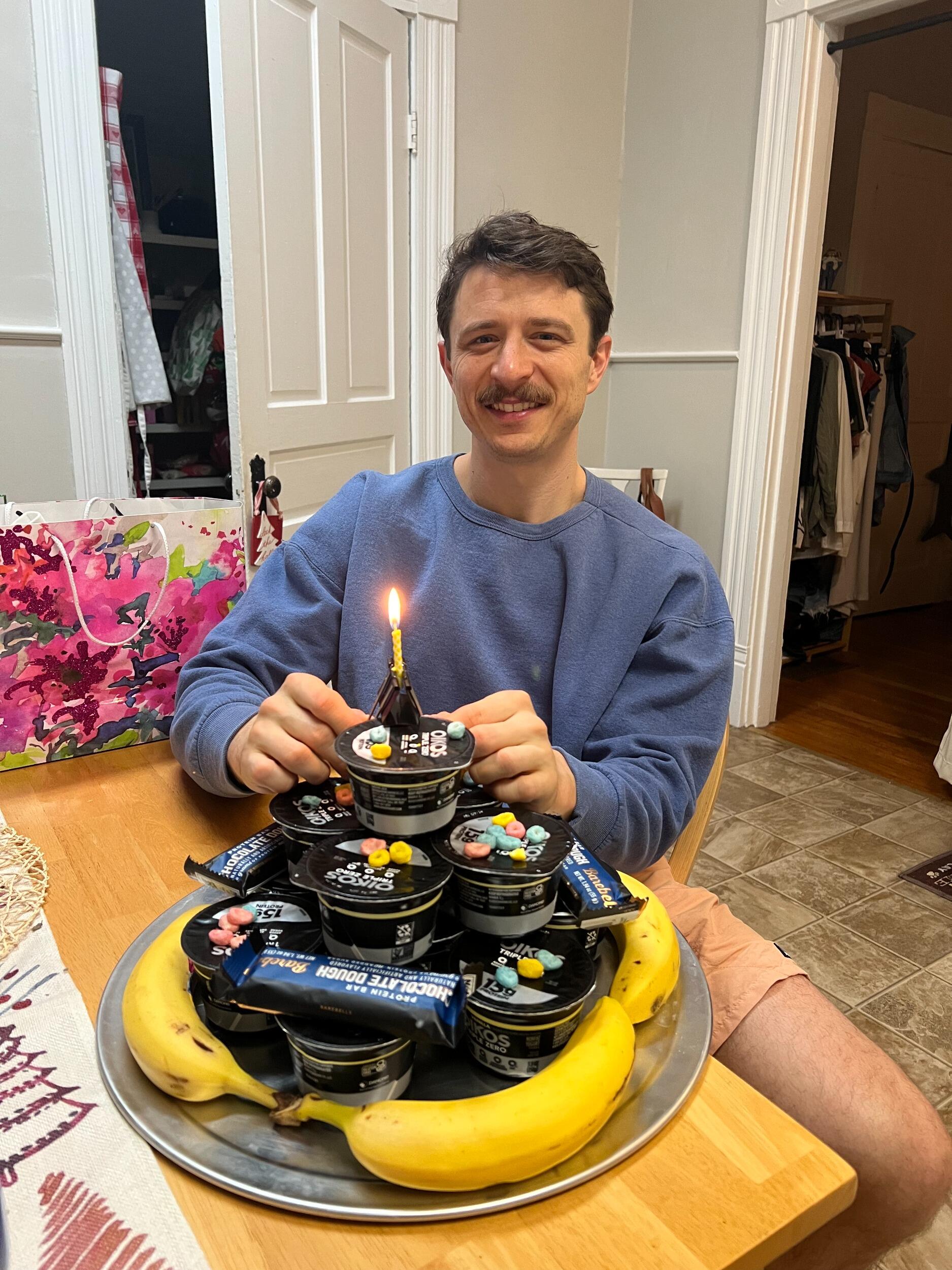 Celebrating Micah's 32nd birthday with his "birthday cake" that includes all of his favorite things- greek yogurt, Magic Spoon cereal, protein bars, and bananas :) 
