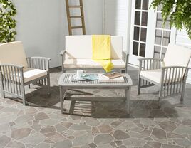 White and gray lounge chairs with gray acacia outdoor table