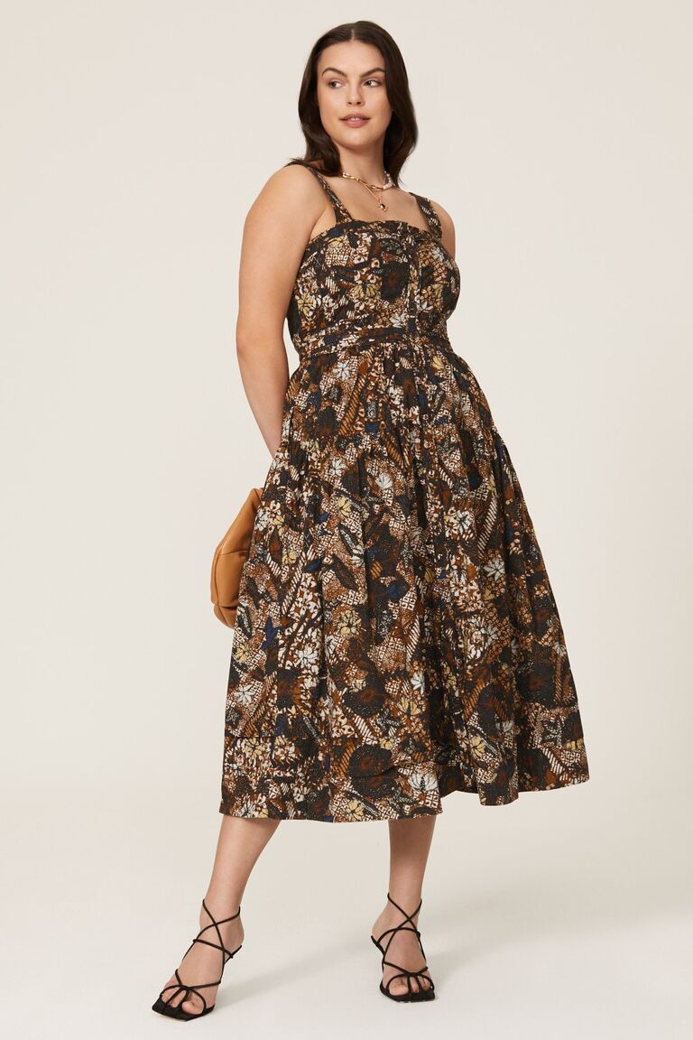 Brown midi dress for a beach wedding from Rent the Runway. 
