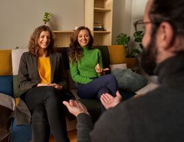 Counsellor talking to a couple during premaritial counselling