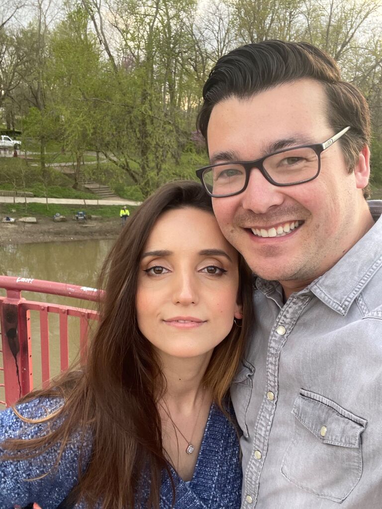 During our first coffee date, we spent an hour and a half getting to know each other on the bridge at Monon. We enjoyed each other so much that we became a couple. We took this photo at the same spot again, where our story began.