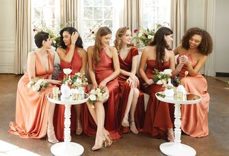 Group of bridemaids wearing beautiful dresses