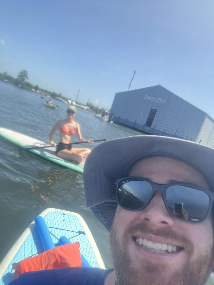 Owen and Allison go paddleboarding at Crystal River to celebrate their 2 year anniversary 