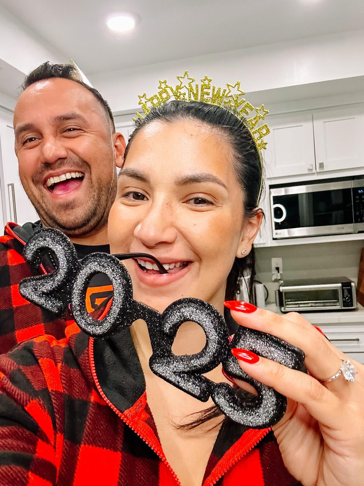 New Years Eve 2025 in our kitchen, both wearing matching onesies—this is our last photo of the 2024 year together.  Let this be our best year yet, and with many more to come.  

As for "Our Story," we hope you can join us this summer as we write the next chapter. 

¡Besos!