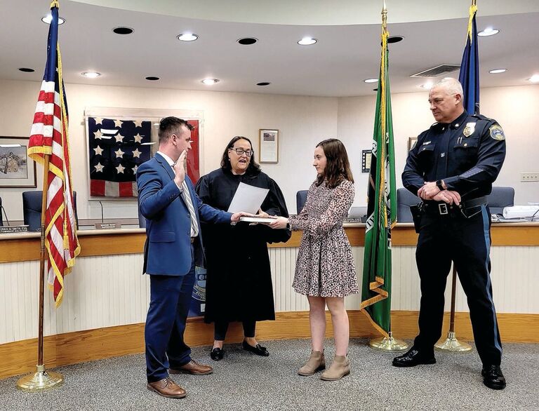 Emmett is sworn into Buckingham Township Police Dept. Julianna and Emmett are ecstatic!