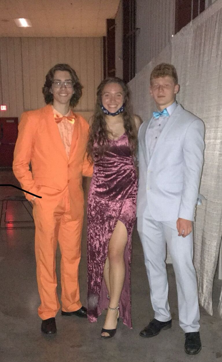 Caleb and Evelyn met at the prom dance of Evelyn's senior year and Caleb's junior year. She showed him a few moves on the dance floor and ended up taking a picture with Caleb and their now, best friend, Vincent. 
