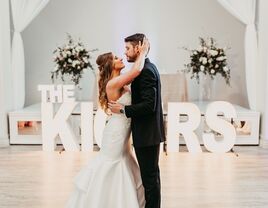 Couple enjoying their first dance on their wedding day