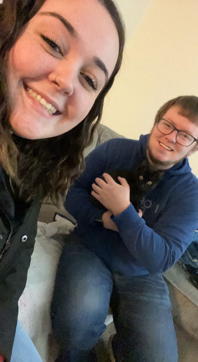 Our first family picture with Olive, our first cat that we rescued on 10/27/21