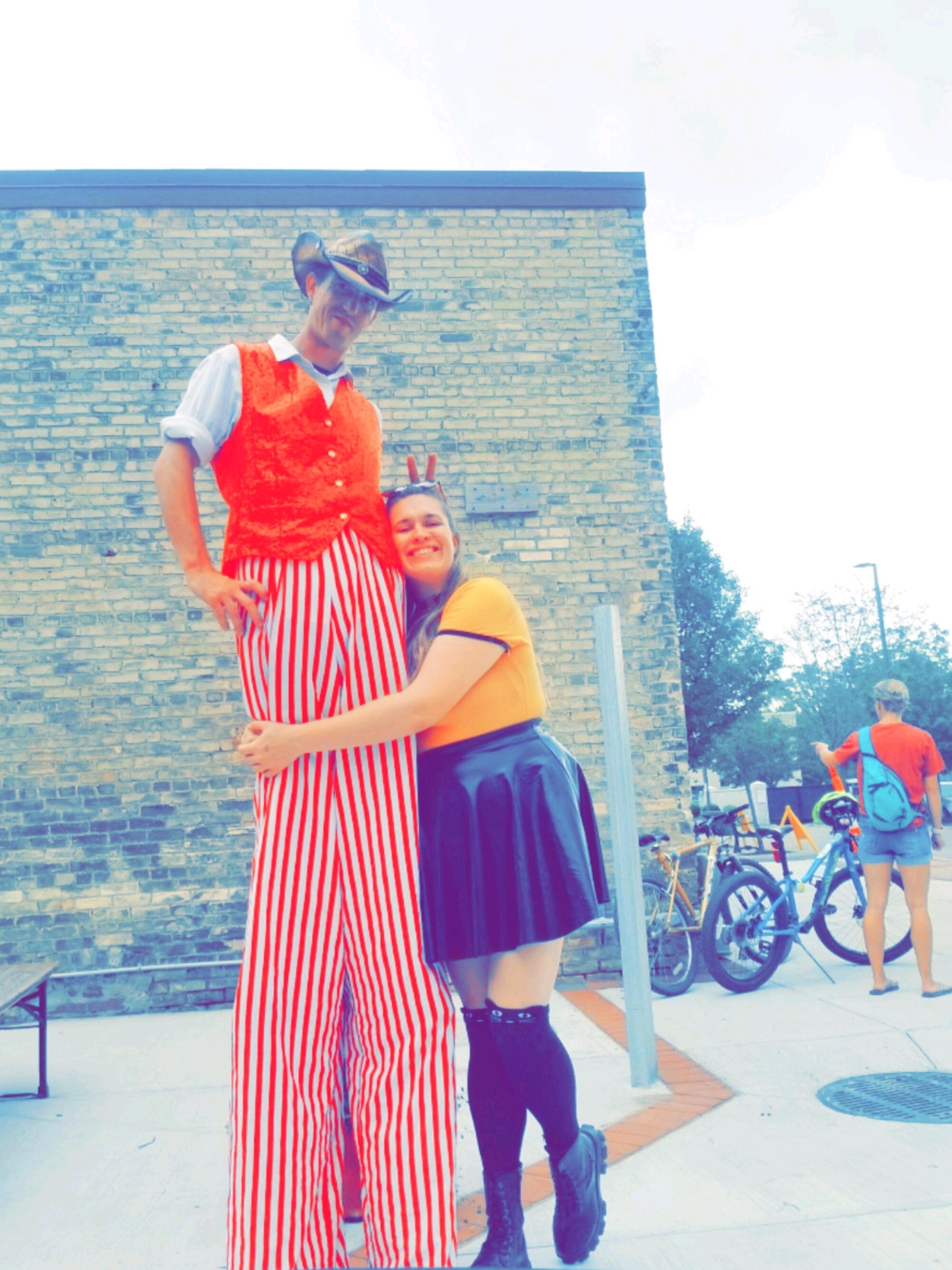 Hanging out at the Zeeland Pumkinfest, one of the many street fair Zeke's does stiltwalking for. 