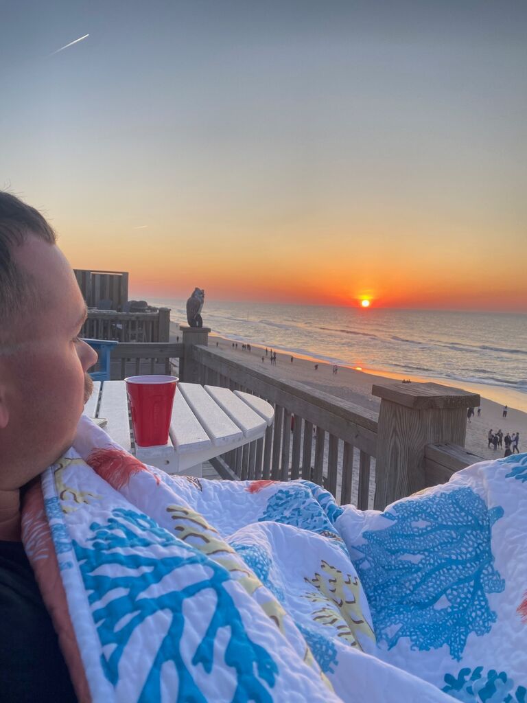 Mindy and Connor listen to the Easter beach service and watch the sun rise the morning after getting engaged.