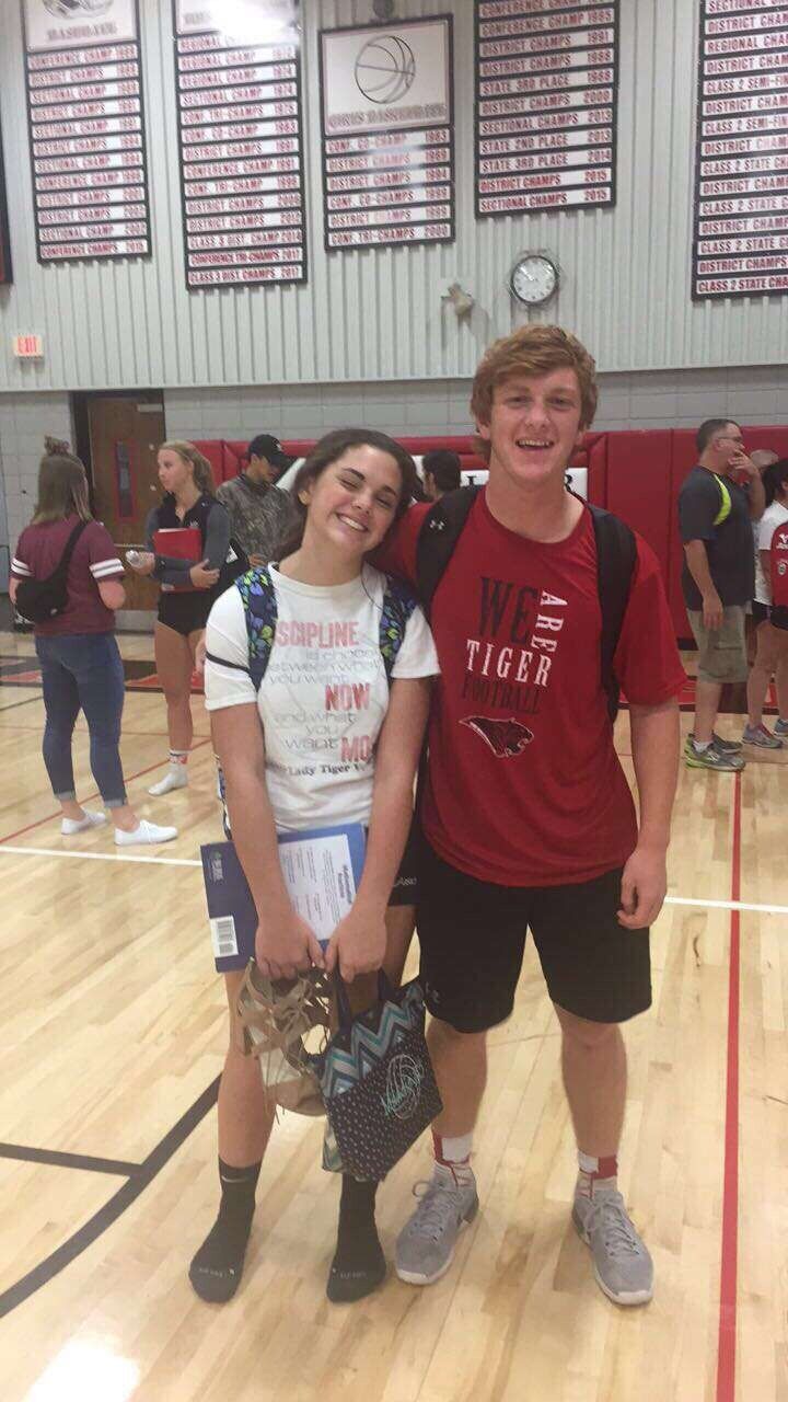 Our first picture together after a home volleyball game! 