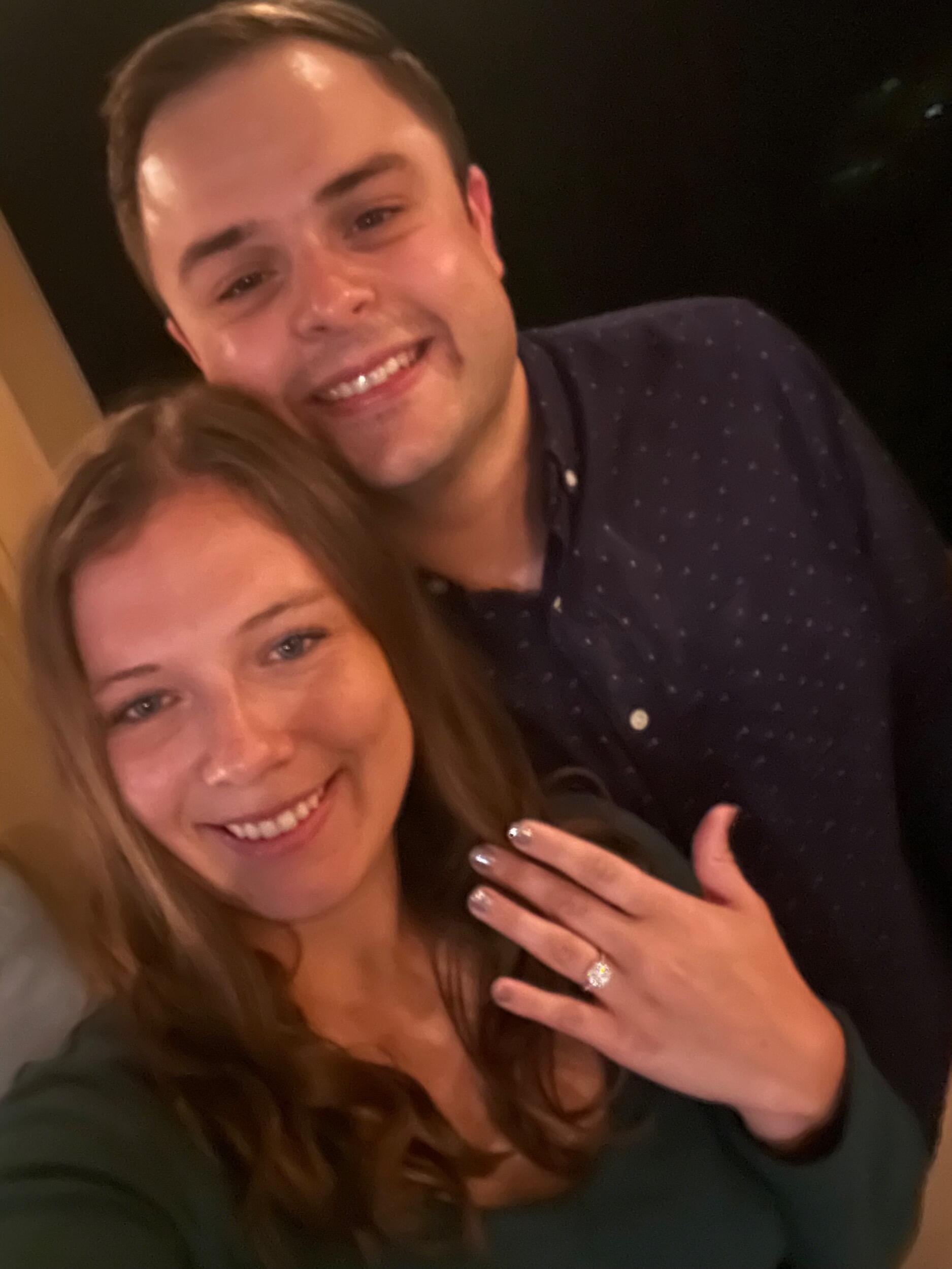 When Joe proposed in Ellicottville, NY  on the balcony of their Airbnb!