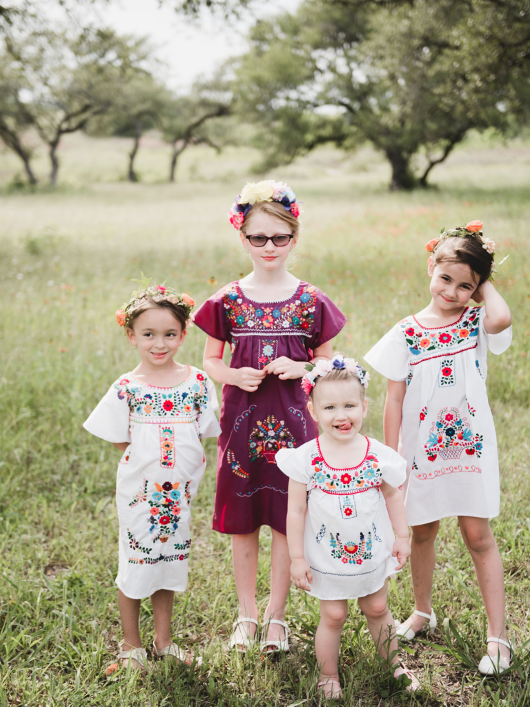Flower girls in traditional Mexican dresses