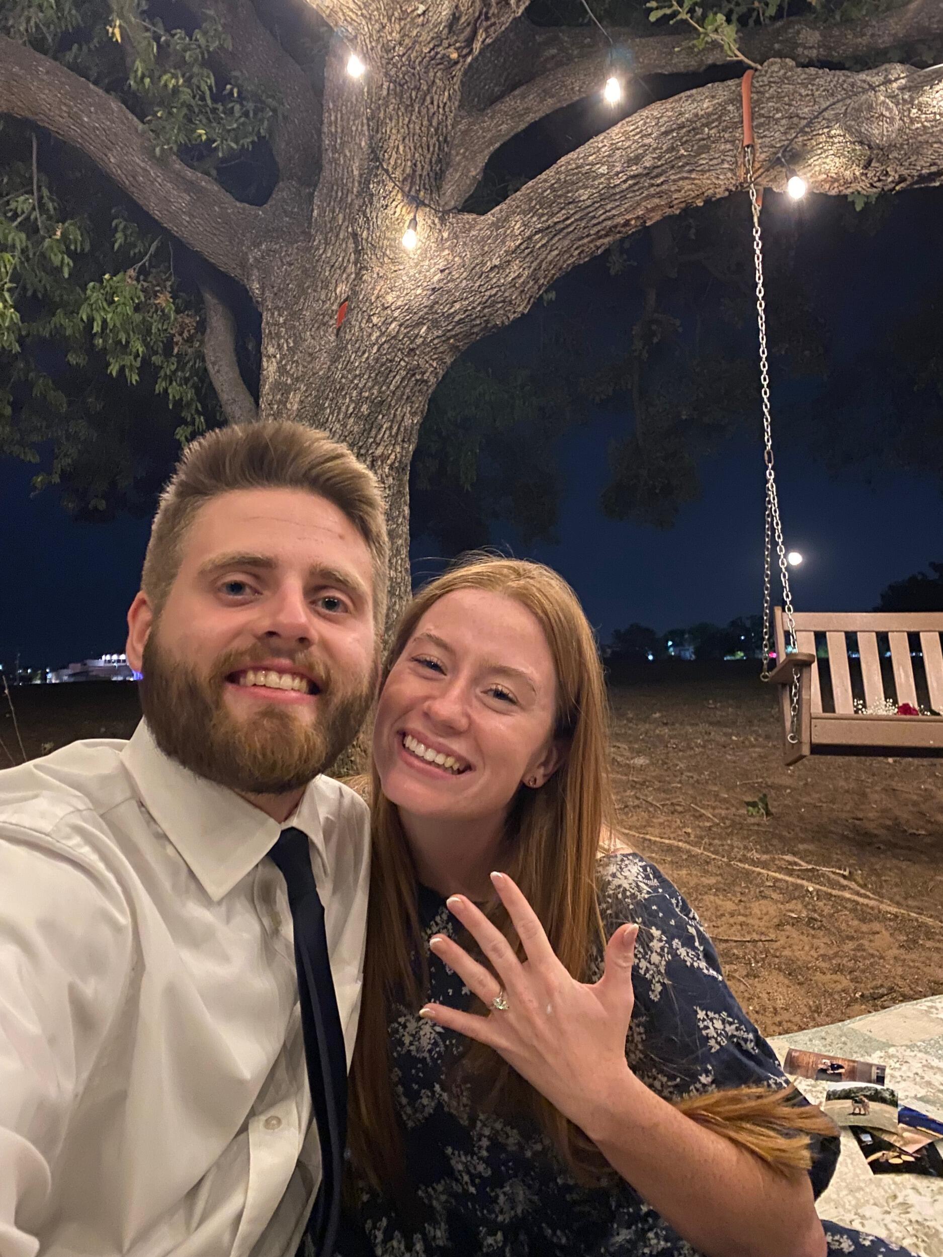And when we say worth it, we mean it. After two years of faithful waiting, prayer, hard work, high highs and low lows, John finally proposed to Cait on one of their "month-a-versaries". It was such a beautiful day! John took Cait to their first date spot at Ascension (another funny story: Cait cried over where they got coffee because she had no idea John was proposing, but once she saw where he was taking her she finally understood and calmed down, LOL), and then to other important spots in their relationship, each of them followed with a letter. After the second or third letter, Cait finally started catching on ;)
The day ended underneath their favorite picnic spot, a huge oak tree with a swing. John had put up lights in the tree that morning, and underneath the tree his faithful friend Garrett Nelson (HUGE shoutout to Garrett, love you bro) had helped set up a quilt with flowers, photos, a bible with Cait's new name on it, and a picnic basket with a *surprise* inside! It was truly magical!!