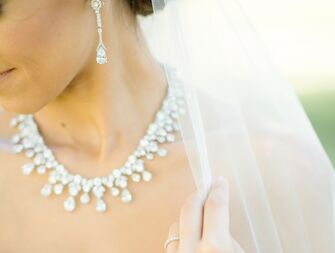 Bridal jewelry: diamond necklace and earrings 